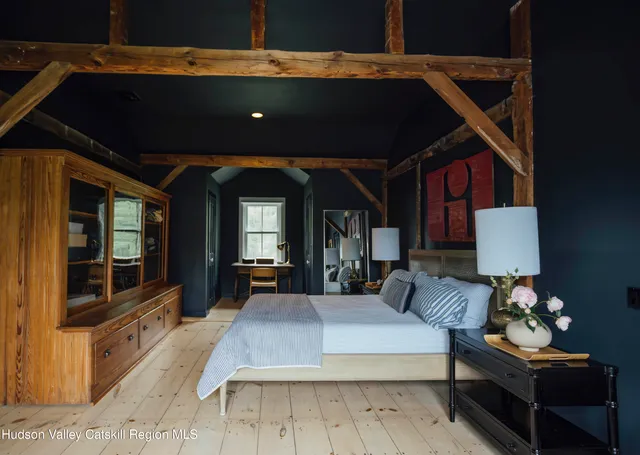 a kitchen with a sink and large window