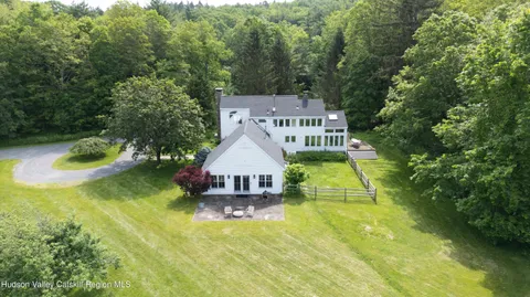 swimming pool view with a outdoor seating space