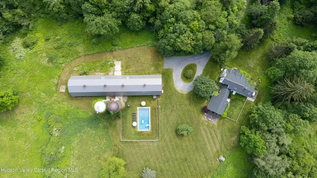 a view of a house with a swimming pool