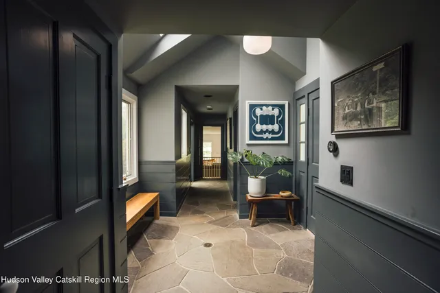 a view of a living room and dining room