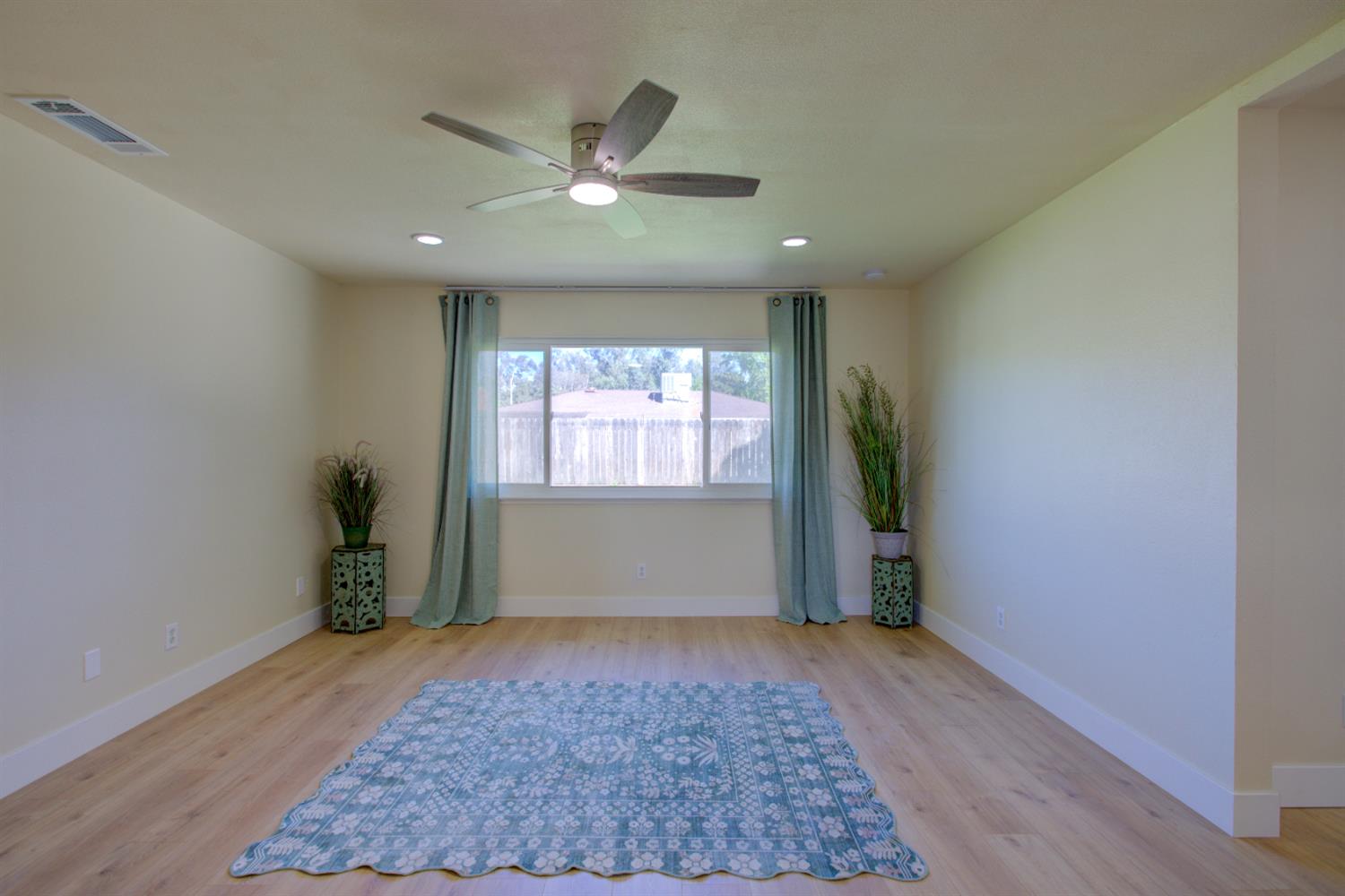 1673 Sacramento Drive Merced, CA 95348 - Photo 15 of 35 a view of an empty room and window