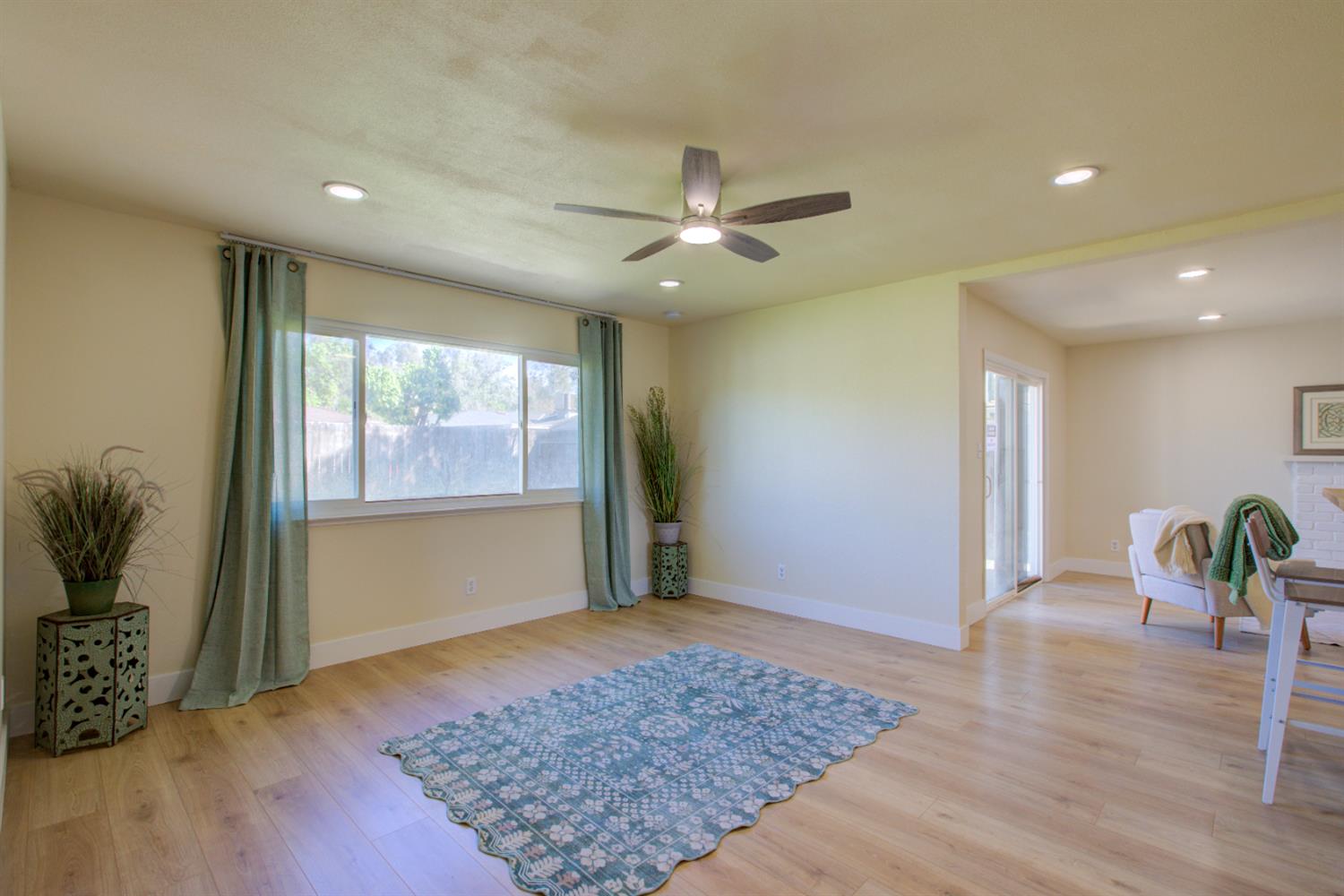 1673 Sacramento Drive Merced, CA 95348 - Photo 16 of 35 a view of an empty room and window
