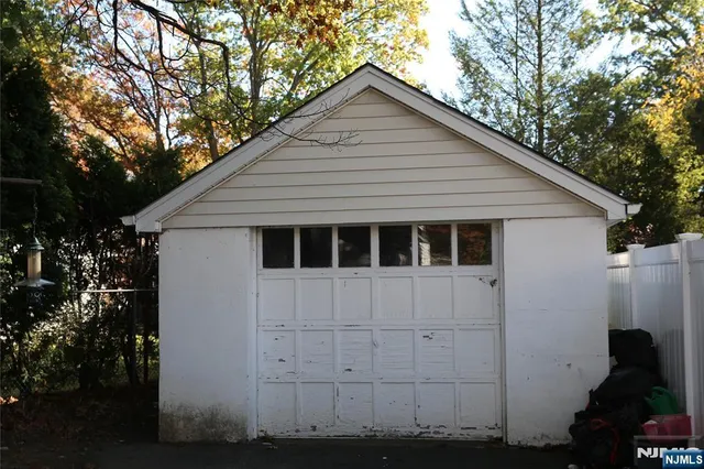 a view of a house with a small yard