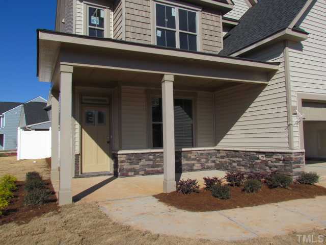 3803 Amandcroft Way Raleigh, NC 27616 - Photo 3 of 4 Large front porch with stone detail