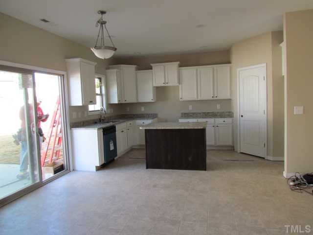 3803 Amandcroft Way Raleigh, NC 27616 - Photo 4 of 4 Breakfast/kitchen with vinyl flooring