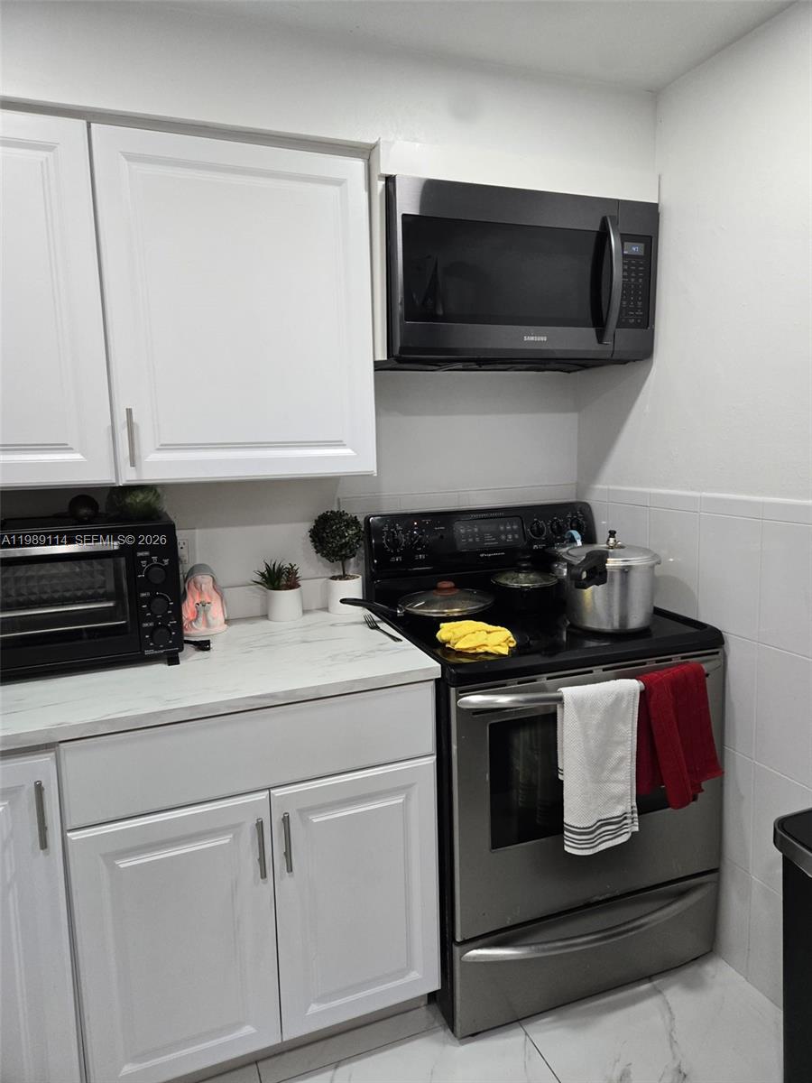 6195 Rock Island Road, Unit 409 Tamarac, FL 33319 - Photo 23 of 26