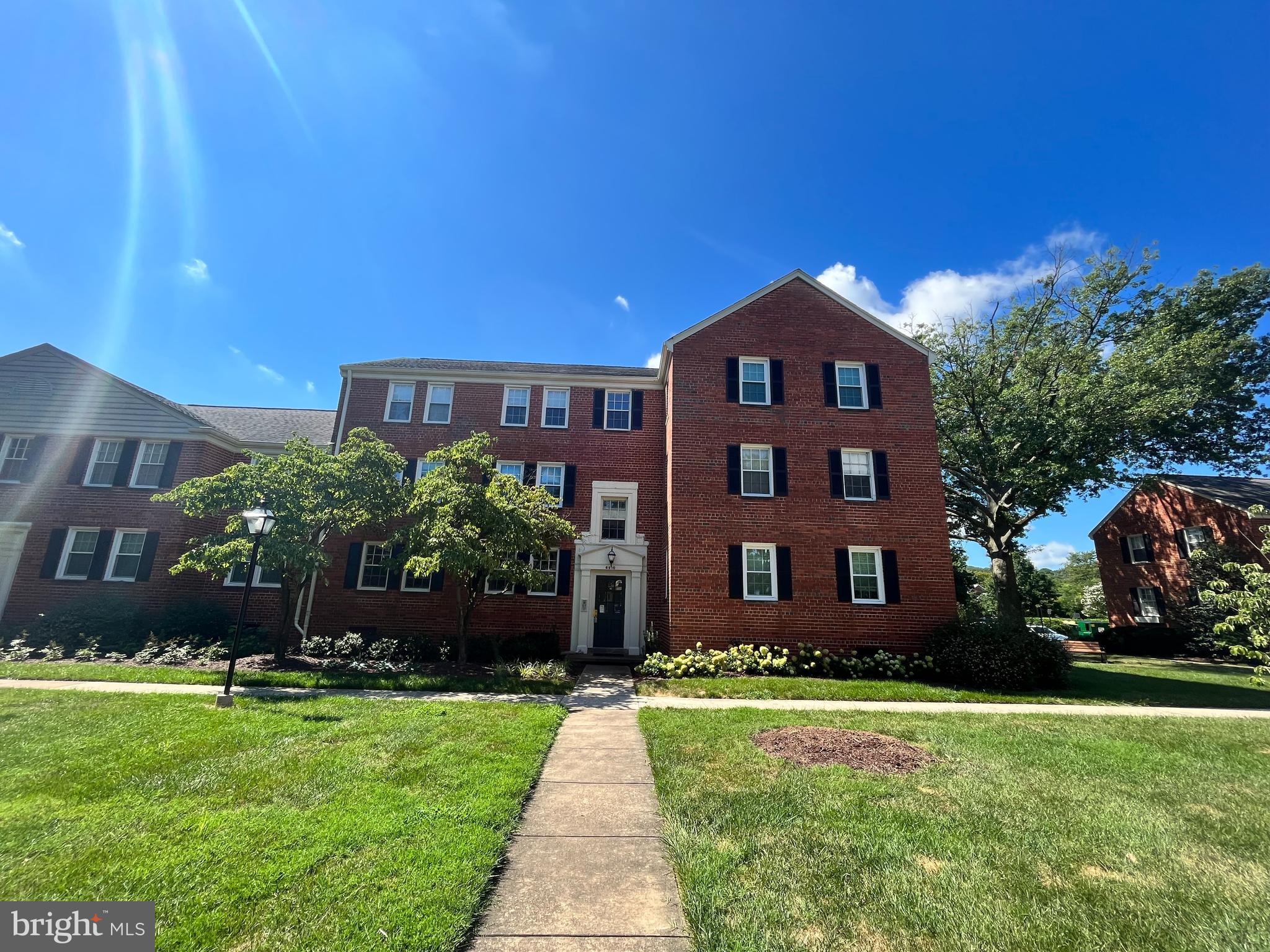6510 Potomac Avenue, Unit C2 Alexandria, VA 22307 - Photo 2 of 15 a front view of a house with a yard