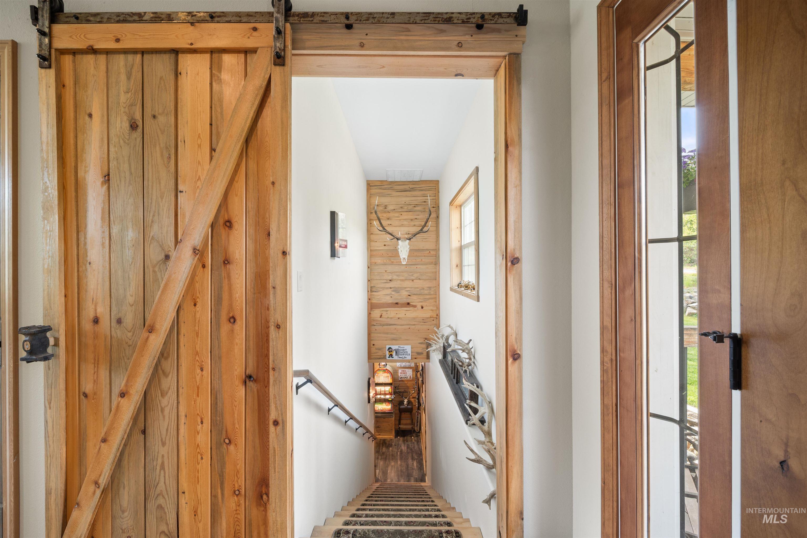 643 Adams Road Orofino, ID 83544 - Photo 23 of 50 Staircase featuring a barn door