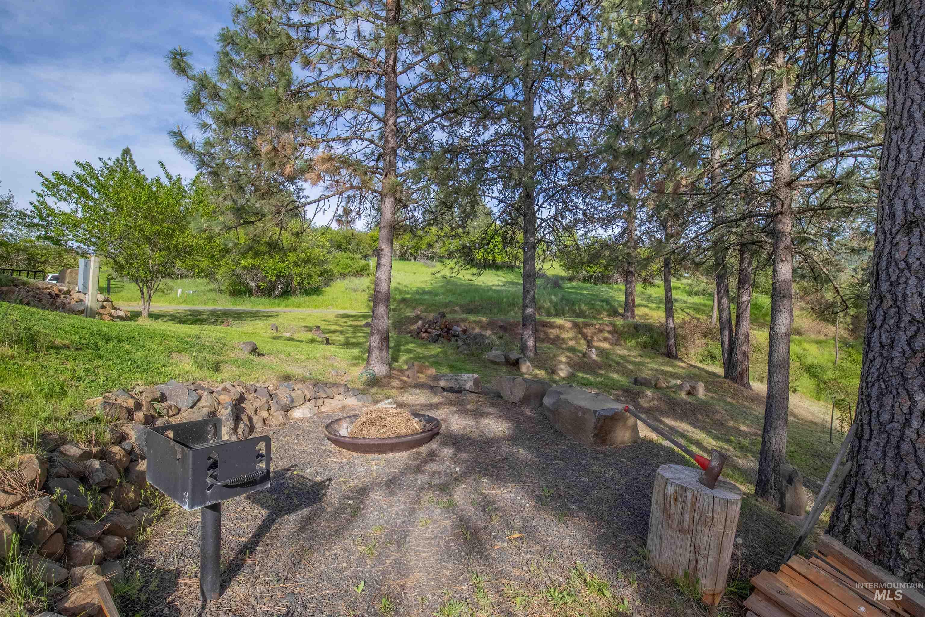 643 Adams Road Orofino, ID 83544 - Photo 38 of 50 View of yard with a fire pit