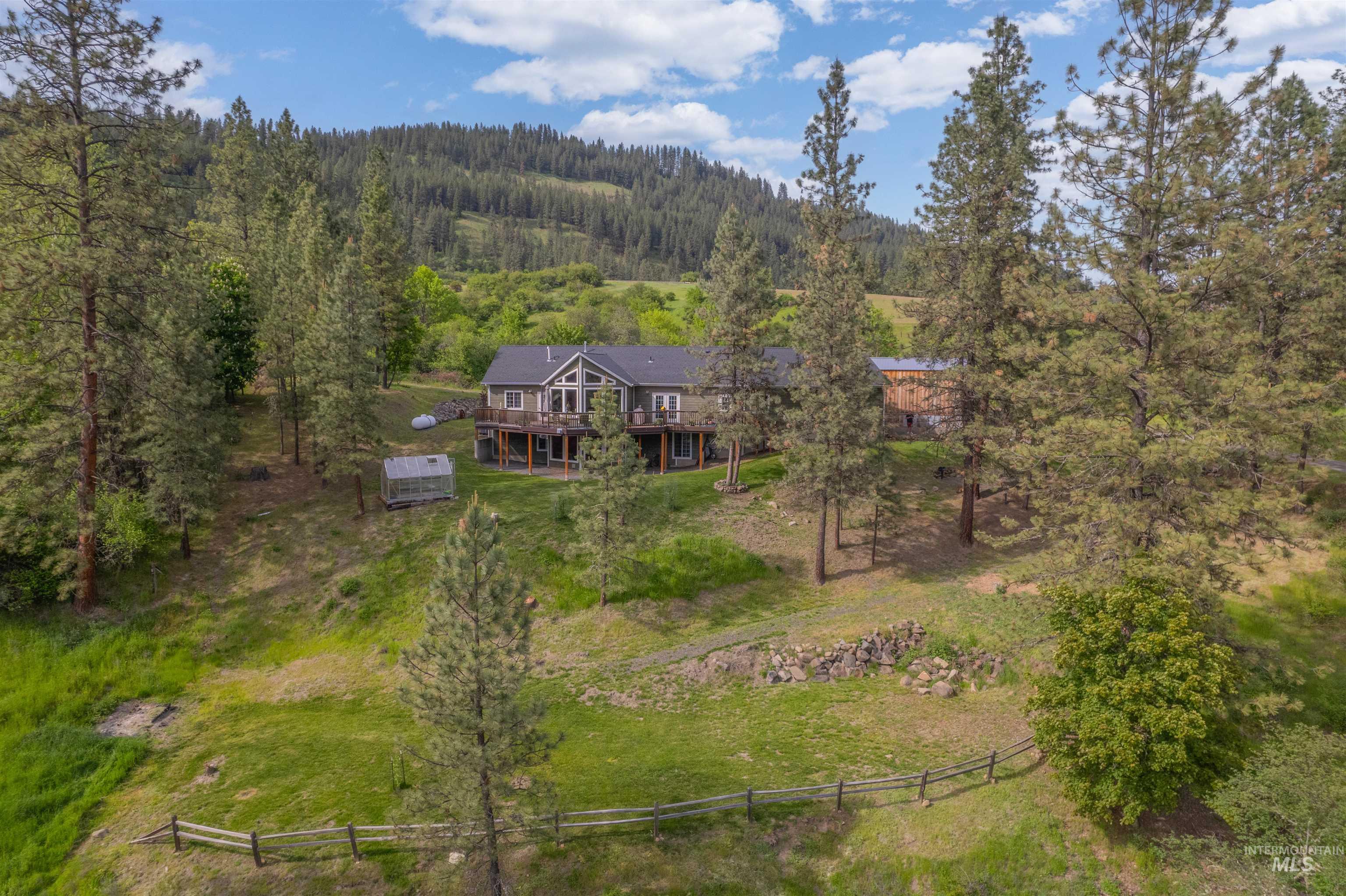 643 Adams Road Orofino, ID 83544 - Photo 45 of 50 Drone / aerial view of a heavily wooded area