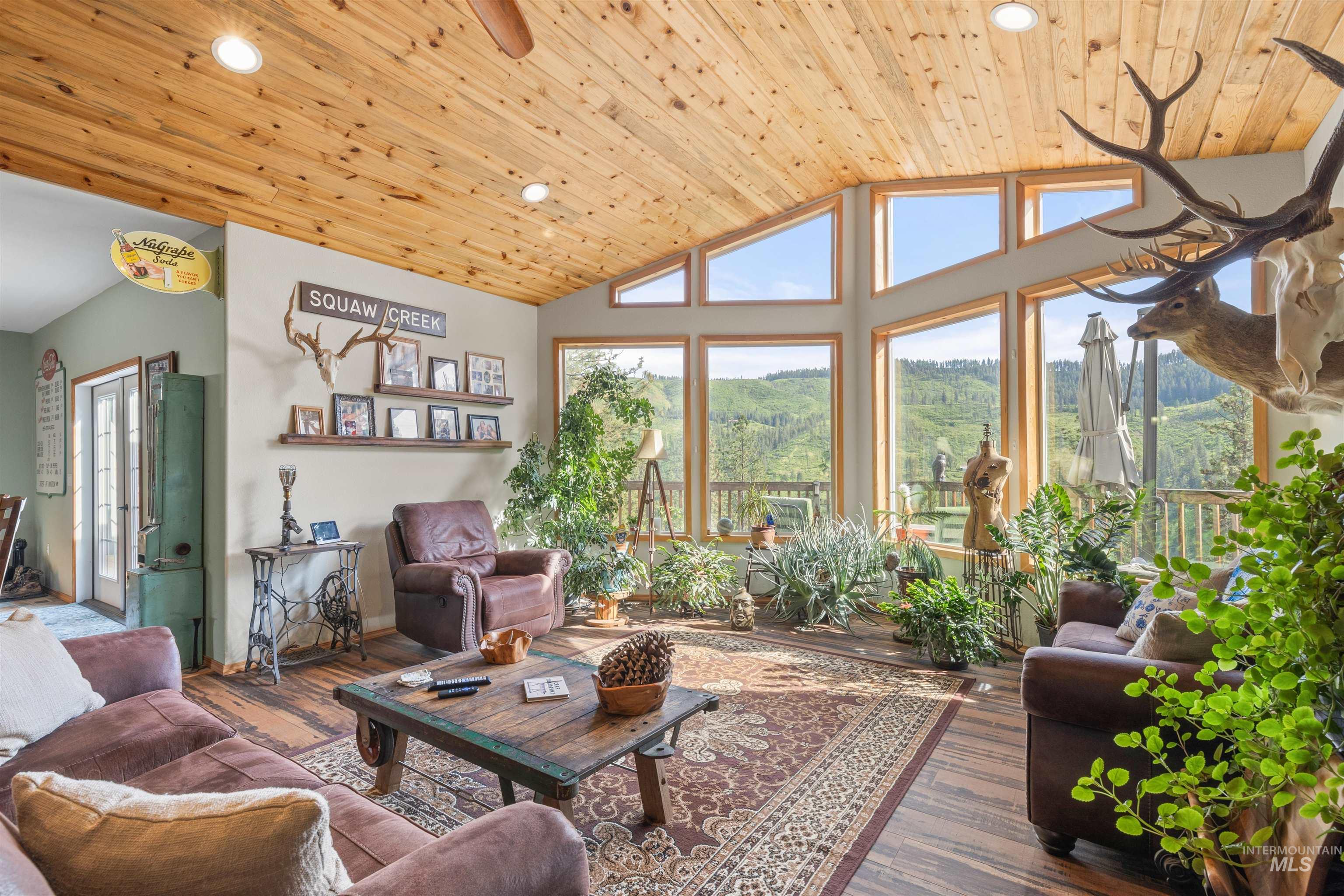 643 Adams Road Orofino, ID 83544 - Photo 7 of 50 Living room featuring a vaulted wooden ceiling, wood finished floors, and recessed lighting