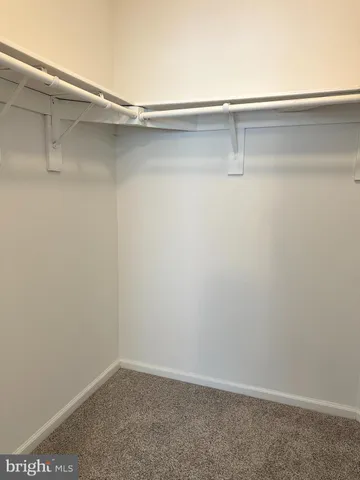 a view of small space with racks on the wall