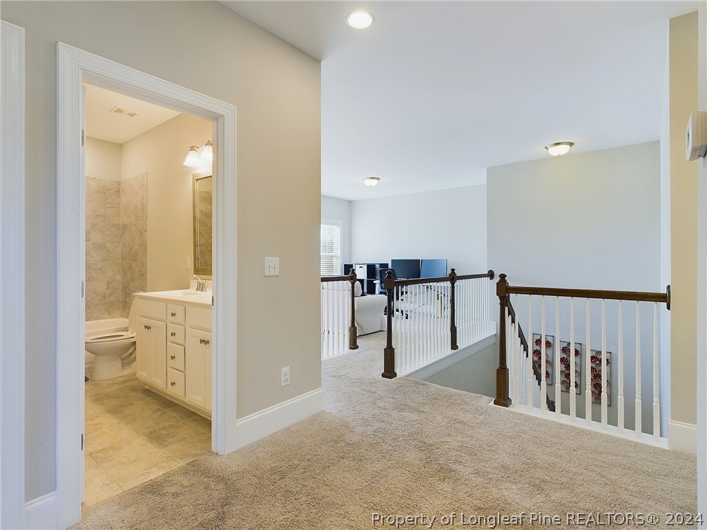 4001 Banks Stone Drive Raleigh, NC 27603 - Photo 28 of 50 a view of a hallway with bathroom