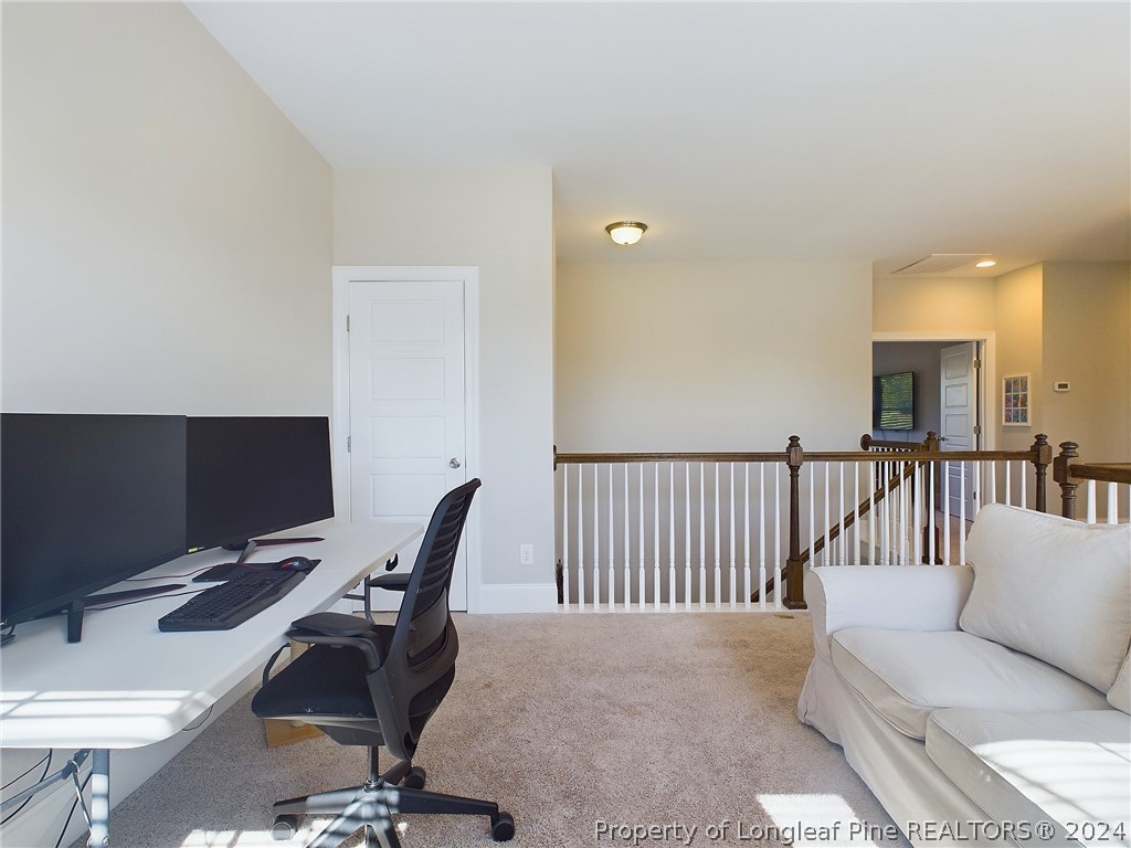4001 Banks Stone Drive Raleigh, NC 27603 - Photo 37 of 50 a view of a livingroom with a couch