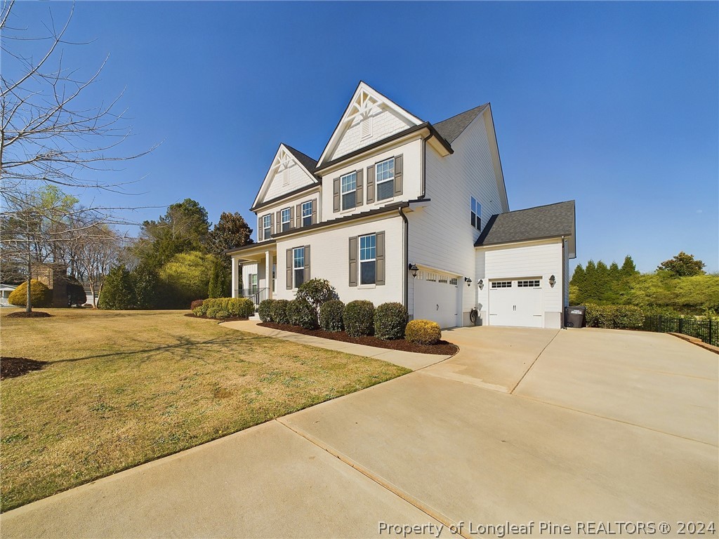 4001 Banks Stone Drive Raleigh, NC 27603 - Photo 43 of 50 a view of garage and yard