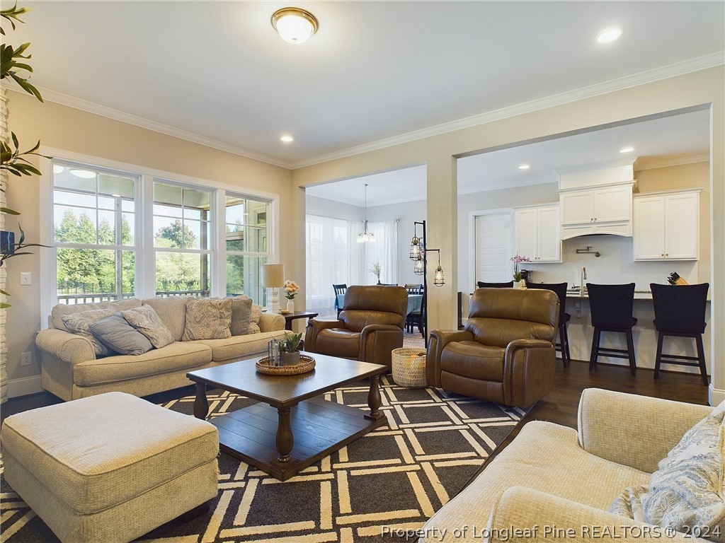 4001 Banks Stone Drive Raleigh, NC 27603 - Photo 7 of 50 a living room with furniture and a large window