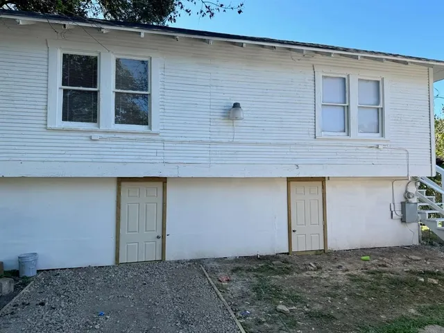a view of backyard of house