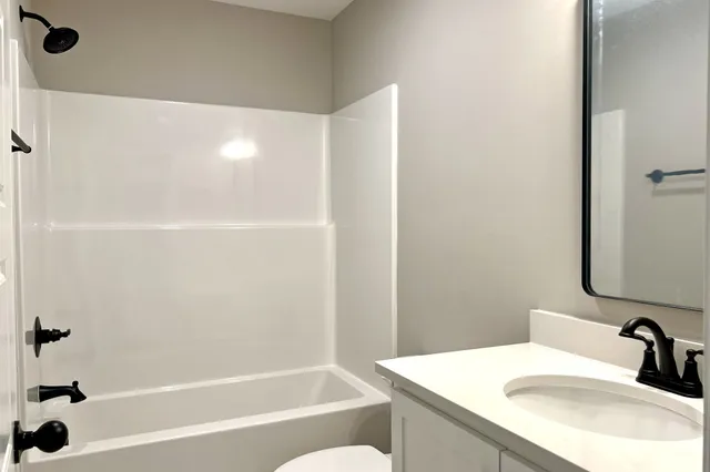 a bathroom with a sink and a bathtub