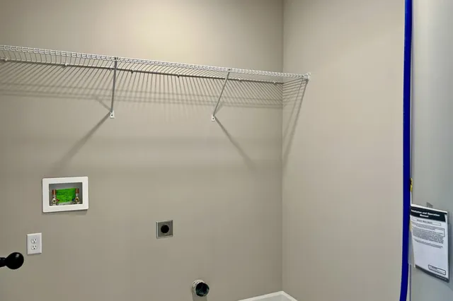 a view of small space with racks on the wall