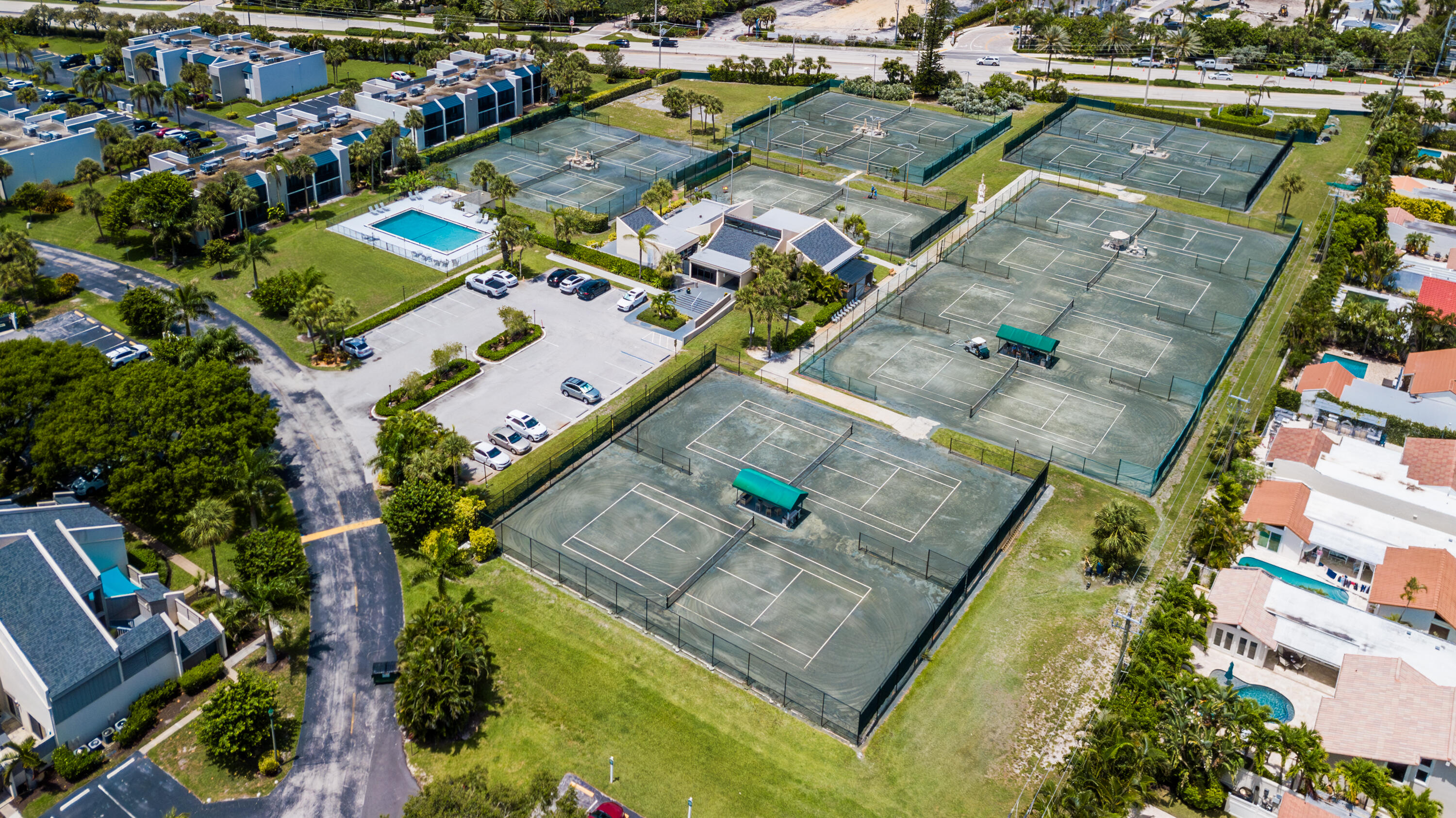 1605 Highway 1, Unit 1D Jupiter, FL 33477 - Photo 30 of 54 an aerial view of residential houses with outdoor space