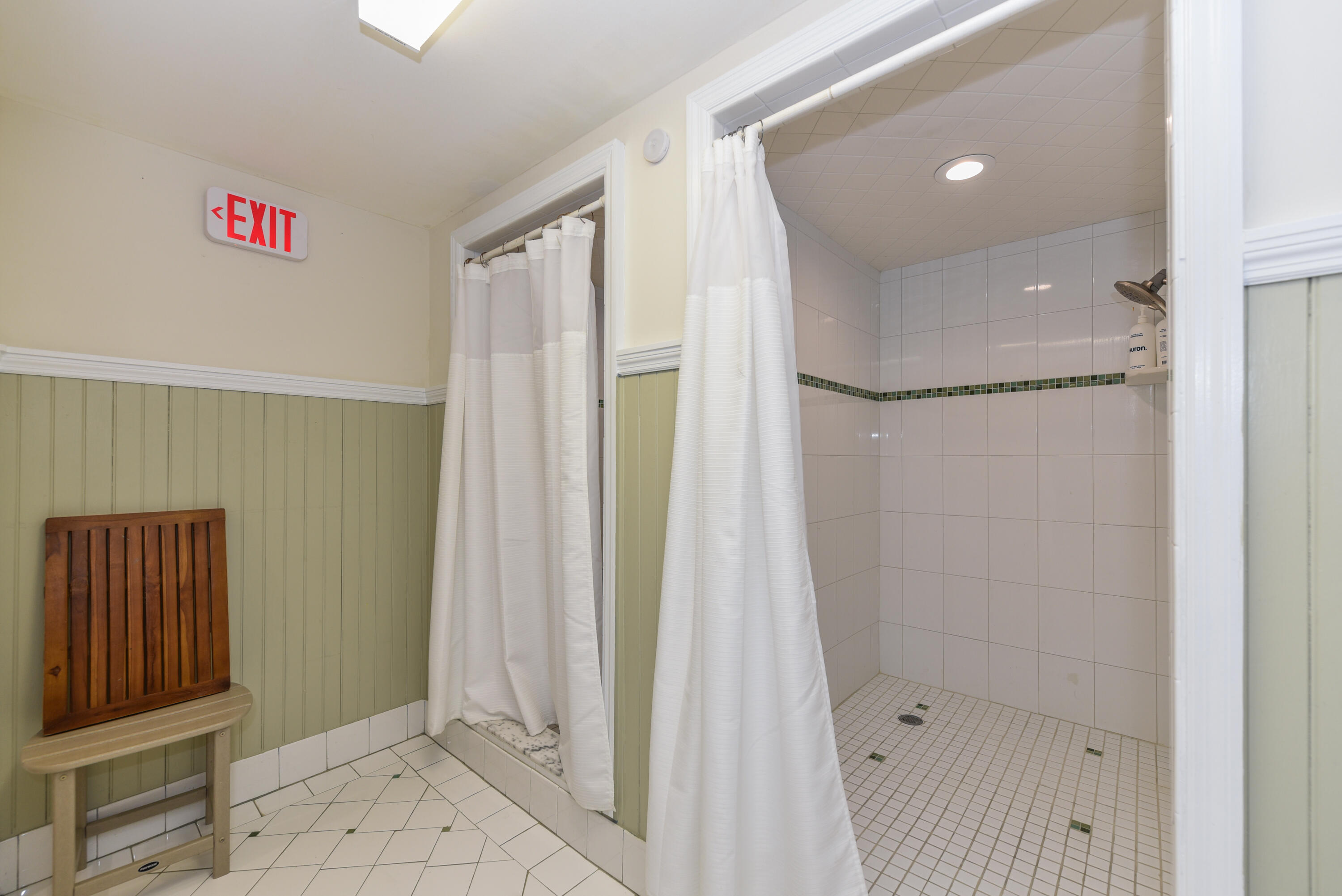 1605 Highway 1, Unit 1D Jupiter, FL 33477 - Photo 35 of 54 a bathroom with a shower and a sink