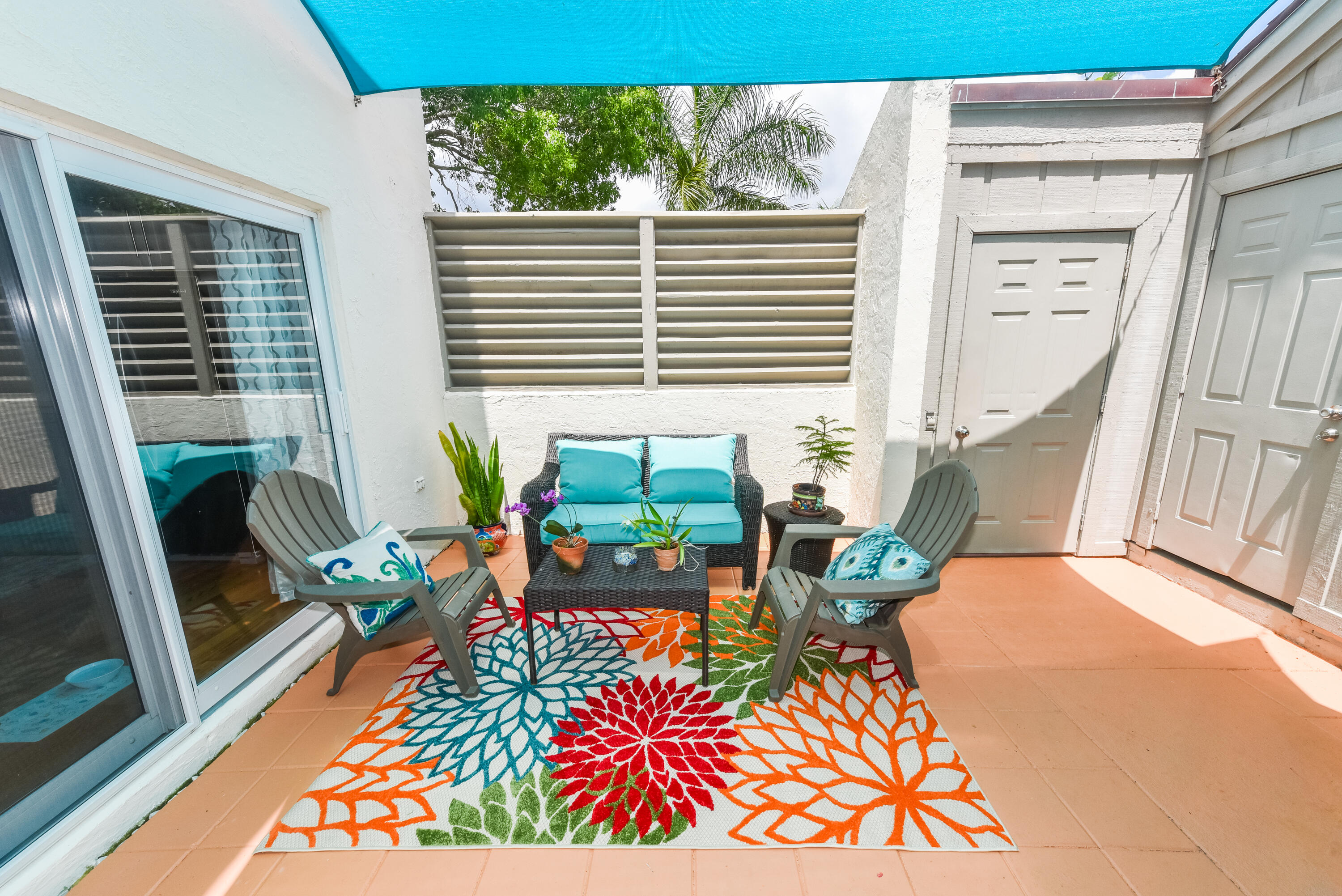 1605 Highway 1, Unit 1D Jupiter, FL 33477 - Photo 6 of 54 a living room filled with furniture and a large window