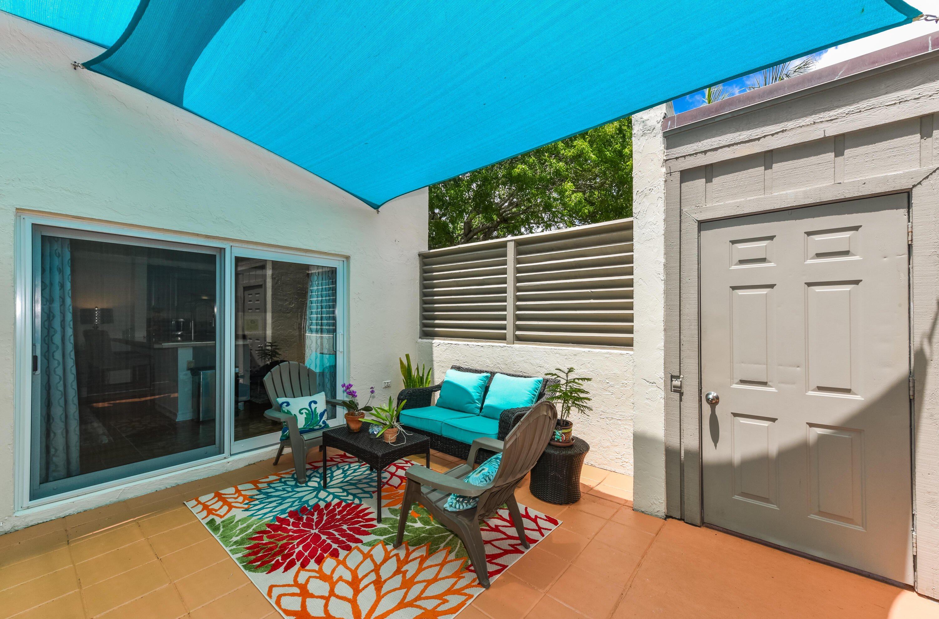 1605 Highway 1, Unit 1D Jupiter, FL 33477 - Photo 10 of 54 a balcony with furniture and a potted plant