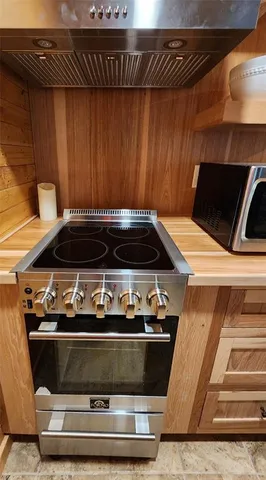 a bathroom with a tub and a shower