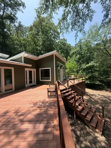 a view of a house with a window and stairs