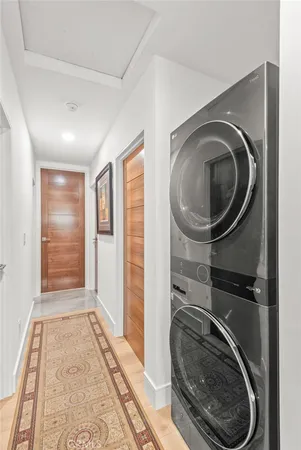 a bathroom with a washer and dryer