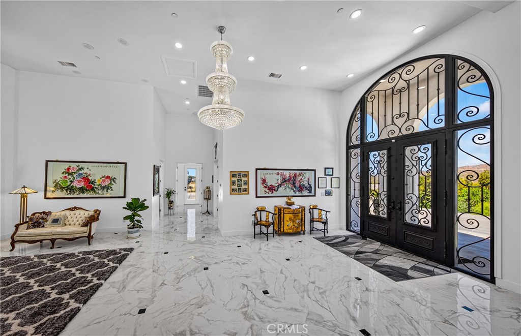 39625 County Line Road Beaumont, CA 92223 - Photo 6 of 54 Entry way with primary Chandelier