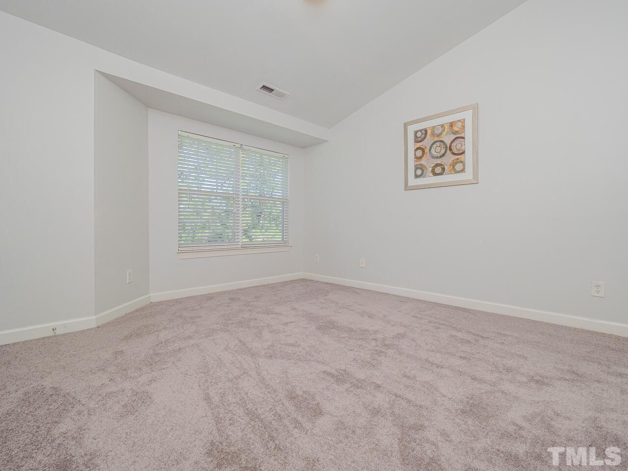 8007 Sycamore Hill Lane Raleigh, NC 27612 - Photo 14 of 22 Spacious bedroom with double closets.
