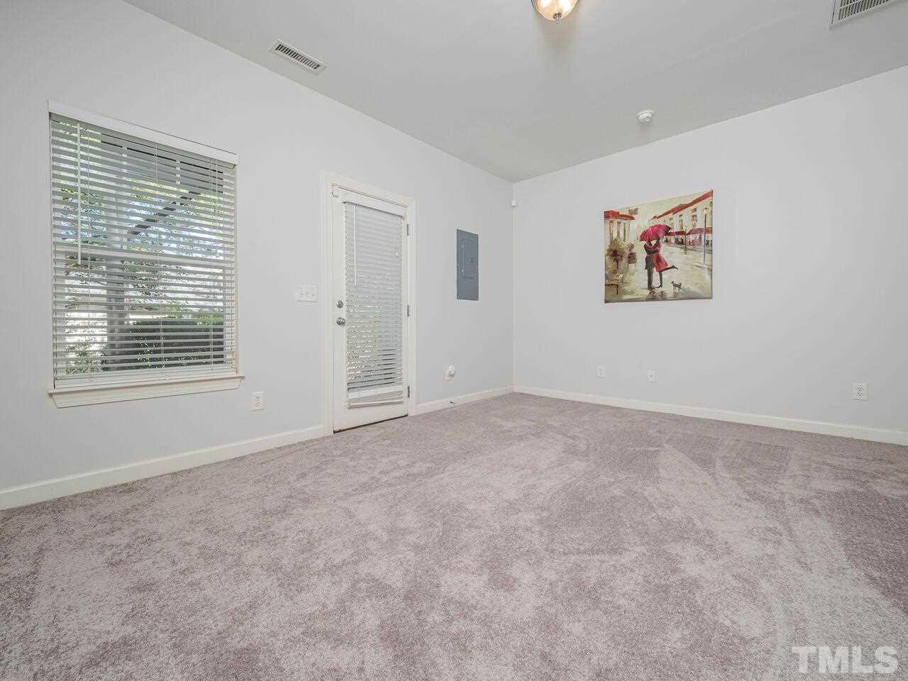8007 Sycamore Hill Lane Raleigh, NC 27612 - Photo 19 of 22 First floor flex space with a half bath.