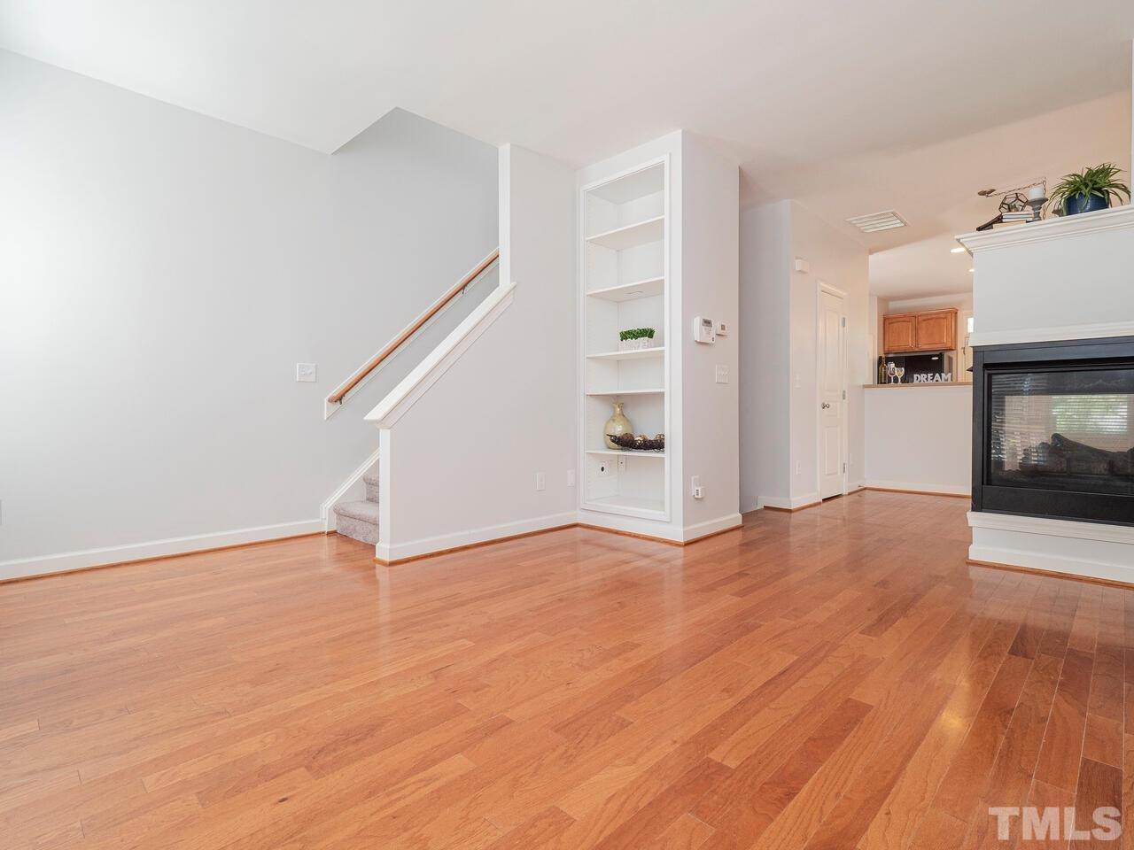 8007 Sycamore Hill Lane Raleigh, NC 27612 - Photo 22 of 22 Hardwood floors and an open floor plan.