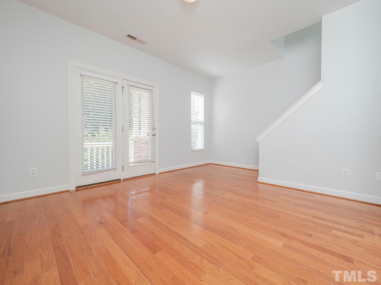 8007 Sycamore Hill Lane Raleigh, NC 27612 - Photo 6 of 22 French doors to front porch.