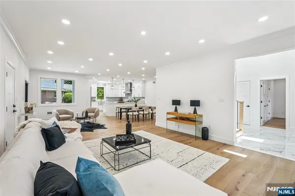 a living room with furniture and a table