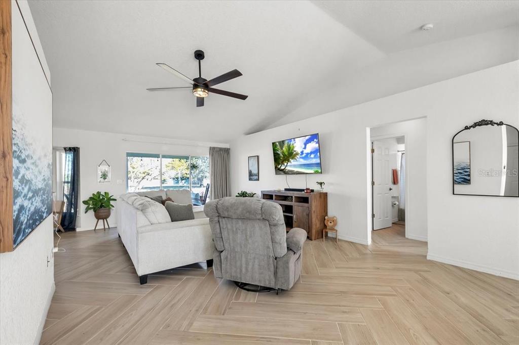 320 Tandil Street Punta Gorda, FL 33983 - Photo 13 of 67 a living room with furniture and a flat screen tv