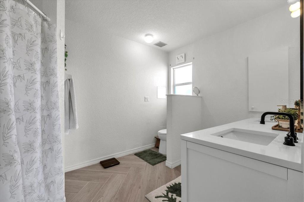 320 Tandil Street Punta Gorda, FL 33983 - Photo 35 of 67 a bathroom with a sink and a toilet