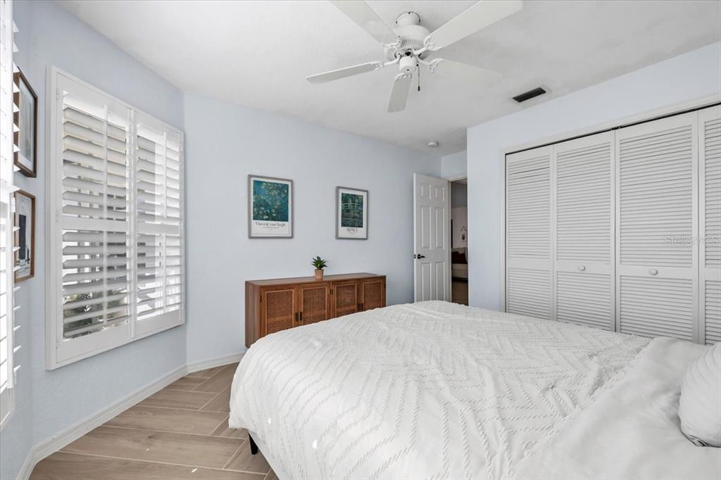320 Tandil Street Punta Gorda, FL 33983 - Photo 41 of 67 a bedroom with a large bed and a window
