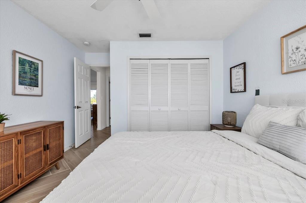 320 Tandil Street Punta Gorda, FL 33983 - Photo 42 of 67 a bedroom with a large bed and a window