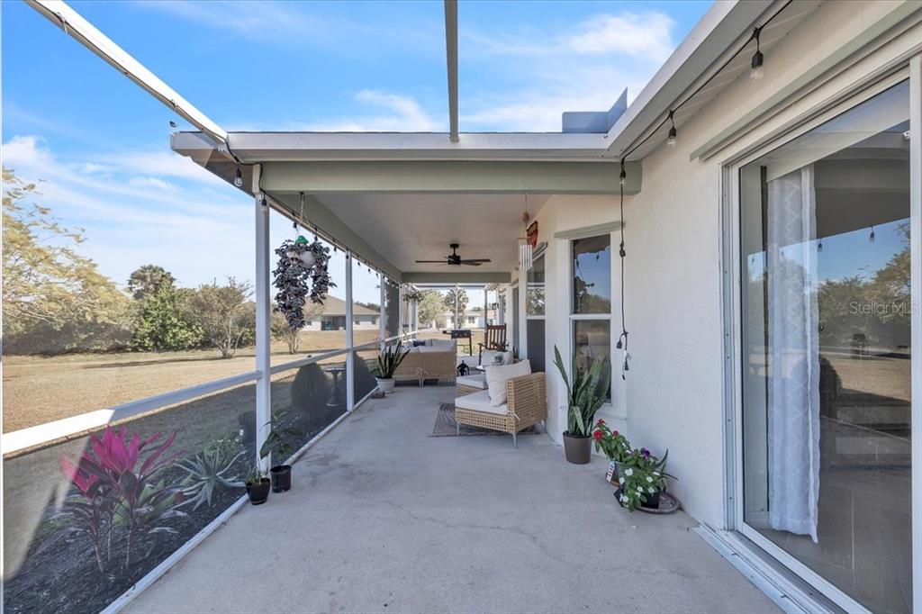 320 Tandil Street Punta Gorda, FL 33983 - Photo 56 of 67 a view of a living room and a garage