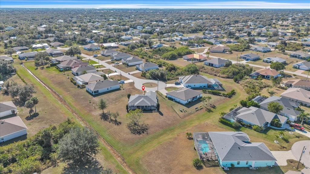320 Tandil Street Punta Gorda, FL 33983 - Photo 65 of 67 an aerial view of residential houses with outdoor space