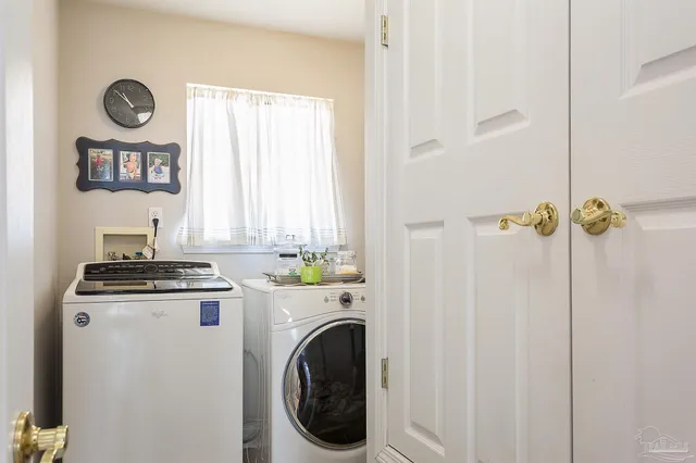 a view of a kitchen with a stove top oven