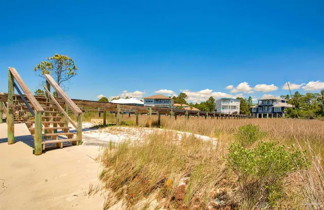 a view of a lake with a house