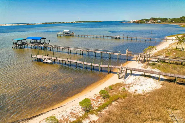 a view of swimming pool with outdoor seating