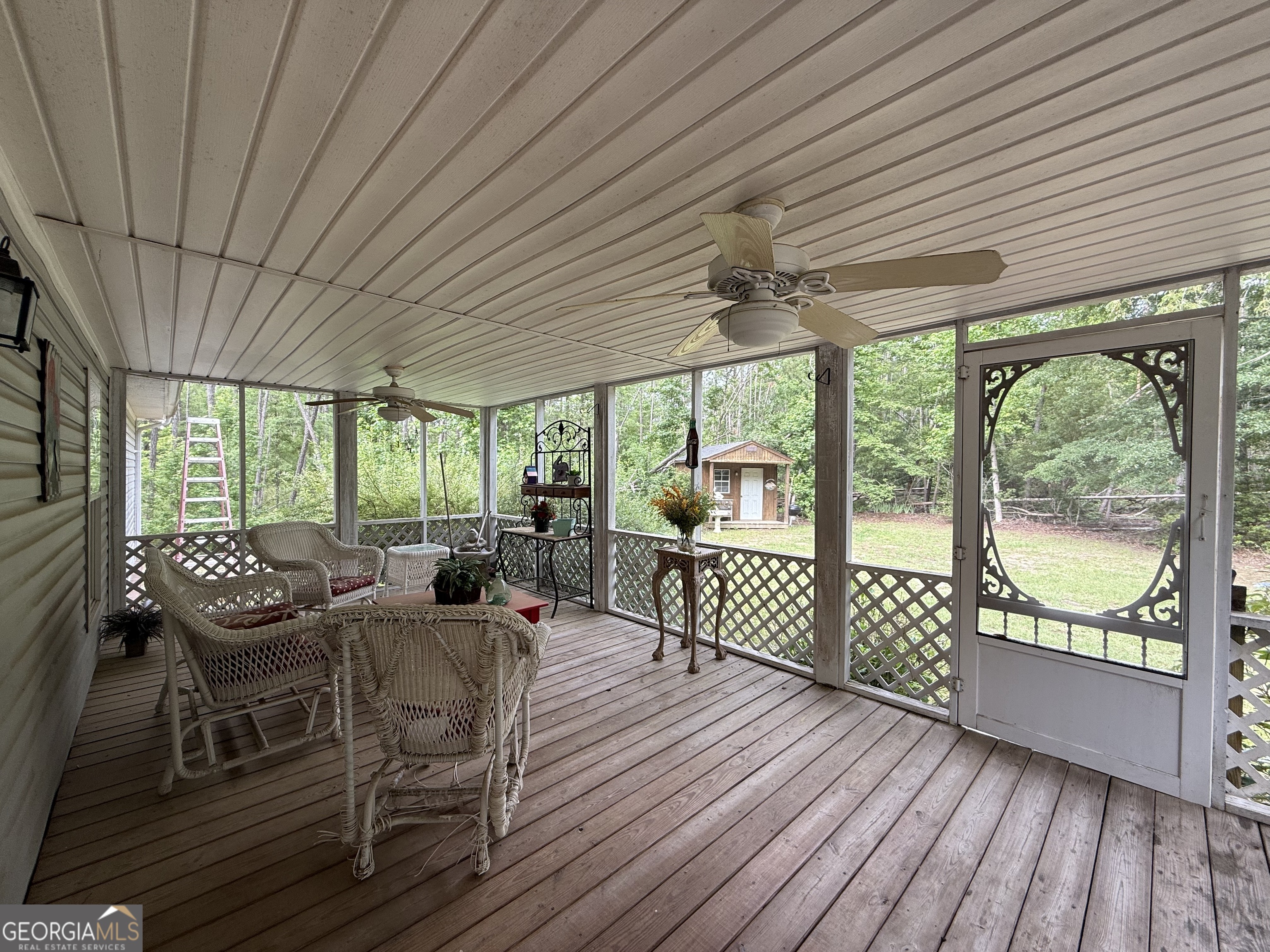 1081 Marshall Church Road Thomson, GA 30824 - Photo 21 of 26 a view of a patio with wooden floor