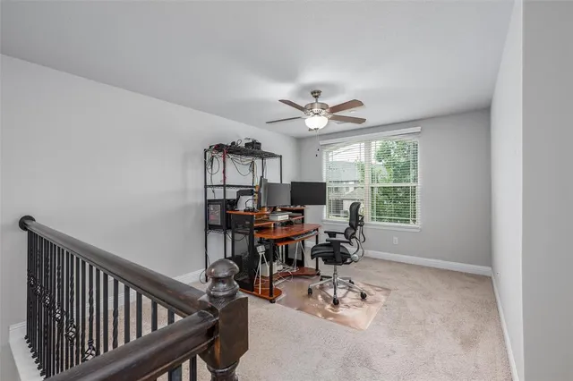 a view of a livingroom with furniture and a window