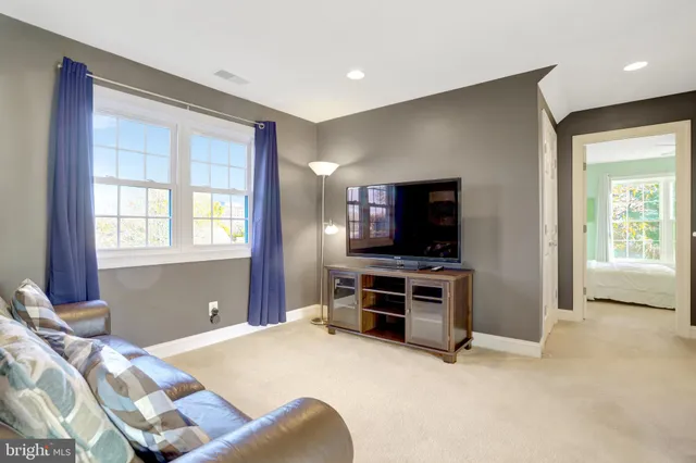 a bedroom with a bed and furniture