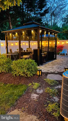 a view of swimming pool with a patio