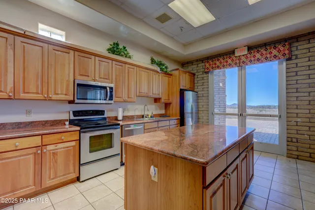 a room with pool table and flat screen tv